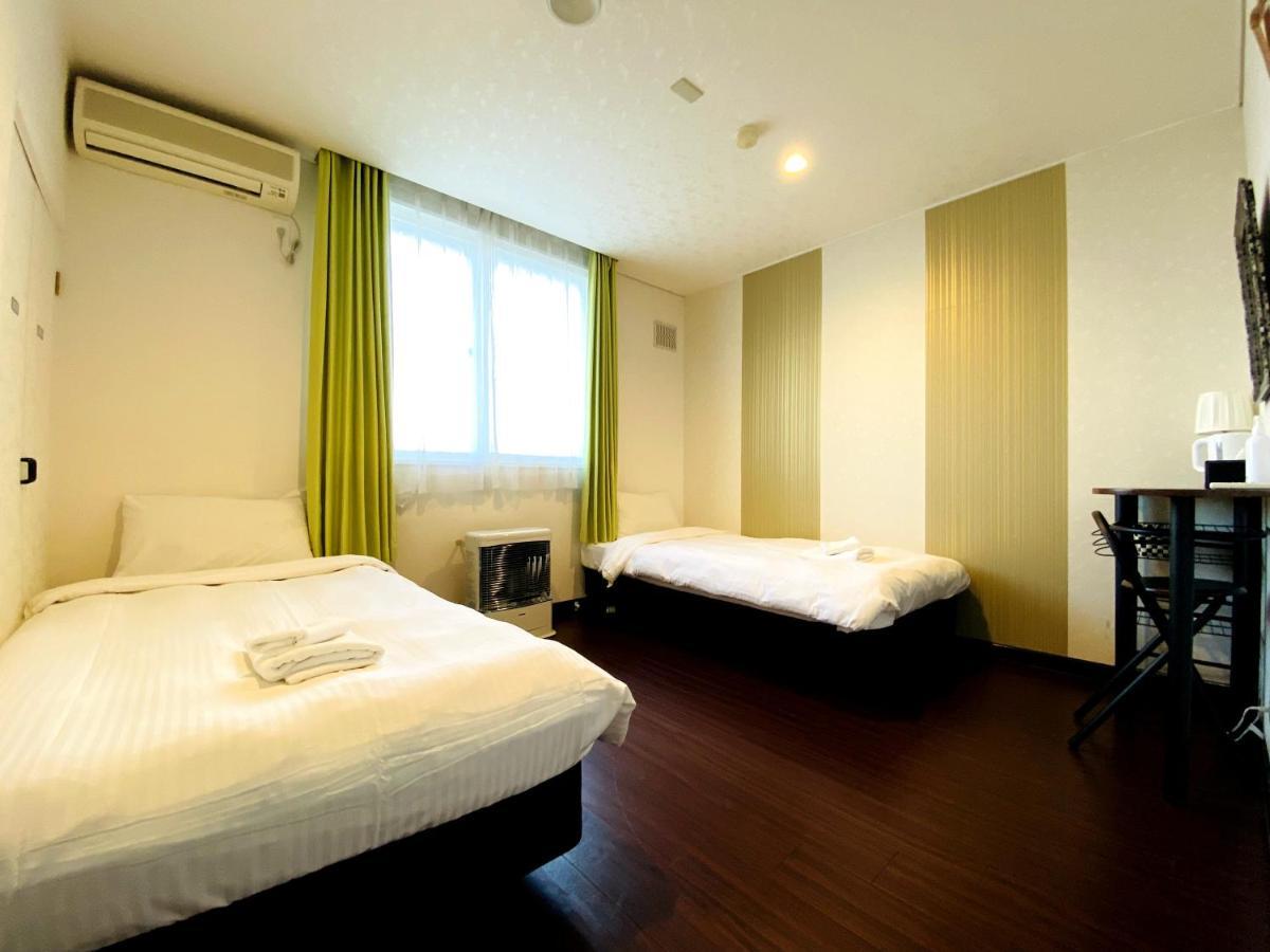 Petit Hotel Melon Furano Exterior photo