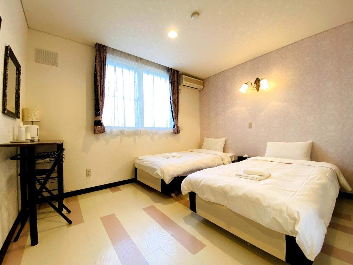 Petit Hotel Melon Furano Exterior photo